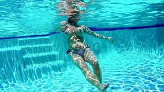 Wife enjoying the Pool ToplessToppless