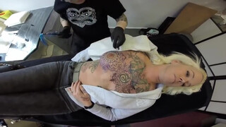8. Getting boobs tattooed,  Video