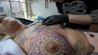 3. Getting boobs tattooed,  Video