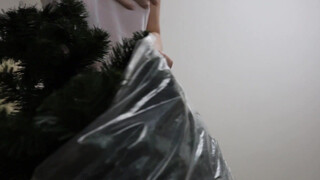10. Taking off decorations from the Christmas tree