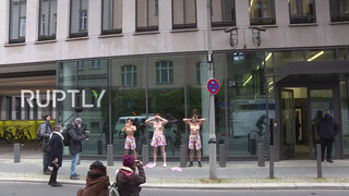 9. Germany: Topless Femen activists protest in front of federal ministry *EXPLICIT CONTENT*