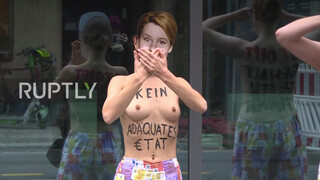 2. Germany: Topless Femen activists protest in front of federal ministry *EXPLICIT CONTENT*