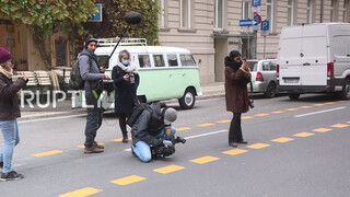 3. Germany: Topless Femen activists protest in front of federal ministry *EXPLICIT CONTENT*