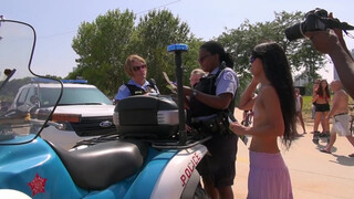 5. Topless Woman Ticketed At GoTopless Day Rally in Chicago