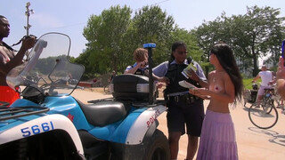 3. Topless Woman Ticketed At GoTopless Day Rally in Chicago