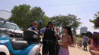 Topless Woman Ticketed At GoTopless Day Rally in Chicago