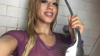 Amazing girl in see through shirt in shower!