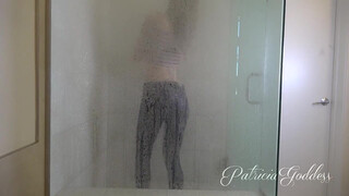 8. Amazing girl is playing under the shower!