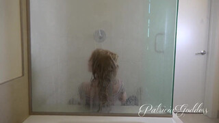 9. Amazing girl is playing under the shower!