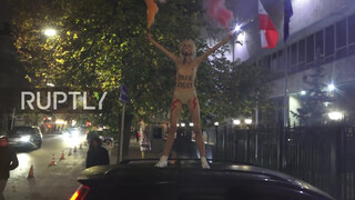 8. Ukraine: Half-naked FEMEN activist protests near Polish Embassy in Kiev *EXPLICIT*