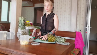 4. Pineapple cutting in black transparent shirt