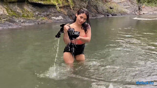 8. Wetlook girl get wet in mountain stream in skirt and tights | Wetlook fishnet tights