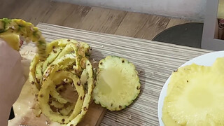 10. Peeling a delicious pineapple