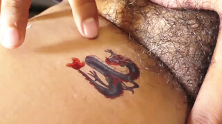 1. How to remove dragon temporary tattoo smooth and relaxing process #satisfying #relaxing #asmr