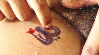 5. How to remove dragon temporary tattoo smooth and relaxing process #satisfying #relaxing #asmr