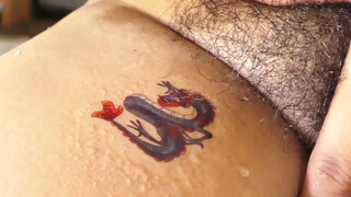 3. How to remove dragon temporary tattoo smooth and relaxing process #satisfying #relaxing #asmr