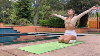 1. The 3-Minute Poolside Yoga Routine To Jump Start Your Day