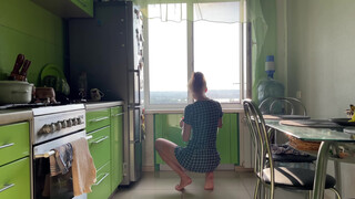 3. Girl cleaning kitchen in short dress