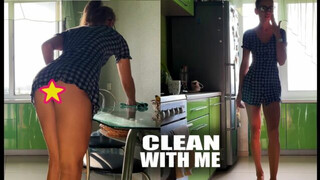 Girl cleaning kitchen in short dress