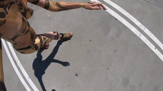 5. Roller Girl in Black & Gold Body Paint