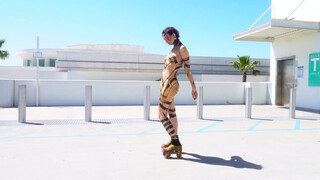 8. Roller Girl in Black & Gold Body Paint