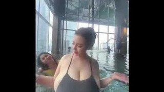 busty chinese women in swimming pool