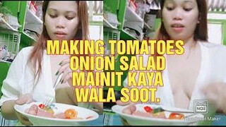 MAKING TOMATOES ONIONS SALAD FOR MY LUCH.