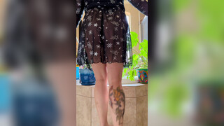 1. *NSFW 18+* Sexy Tattooed Girl with nice booty tries on see through short black dress