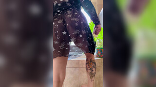 7. *NSFW 18+* Sexy Tattooed Girl with nice booty tries on see through short black dress