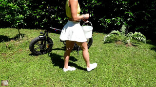 1. SOCOLA CLEANING HER BICYCLE BEFORE A SKIRT RIDE