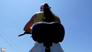 7. SOCOLA CLEANING HER BICYCLE BEFORE A SKIRT RIDE