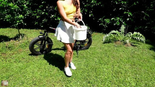 SOCOLA CLEANING HER BICYCLE BEFORE A SKIRT RIDE