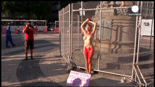 5. Chained naked to a fence, woman protests against sexism in Brazil
