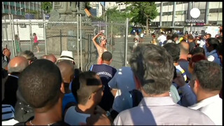 8. Chained naked to a fence, woman protests against sexism in Brazil