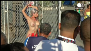 10. Chained naked to a fence, woman protests against sexism in Brazil