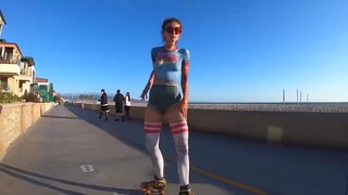 3. ROLLER GIRL at the Beach Wearing Body paint