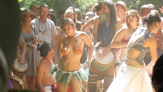 8. Topless and Body Painted Hippie at Drum Circle-oc