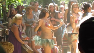 10. Topless and Body Painted Hippie at Drum Circle-oc