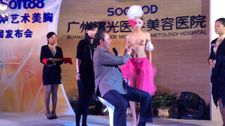 8. On stage breast measuring in China.[Texted]