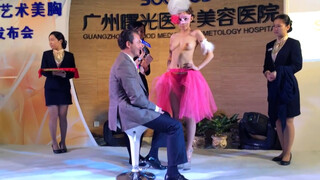 3. On stage breast measuring in China.[Texted]