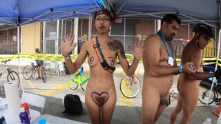 1. Triangle Heart Boobs. Body paint tent with nude artist who shows off her small tits and big bush.