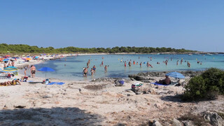 2. Happy naked sunbathers in Spain