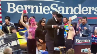 6. Bernie Sanders Got Milk? Topless Women Join Bernie Sanders On Stage To Discuss Animal Exploitation!