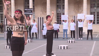 2. France: Topless FEMEN activists protest violence against women in Paris *EXPLICIT*
