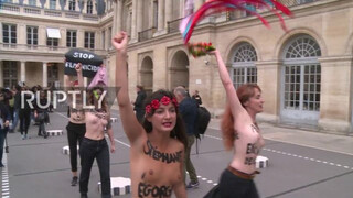 France: Topless FEMEN activists protest violence against women in Paris *EXPLICIT*