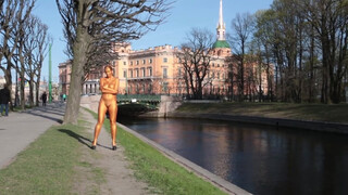 9. Golden girl nude in public