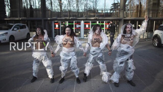 7. Spain: Topless FEMEN activists decry violence against women in Madrid *EXPLICIT*