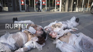Spain: Topless FEMEN activists decry violence against women in Madrid *EXPLICIT*