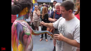 6. Andy Golub body paints model Tynisha Eaton in Times Square
