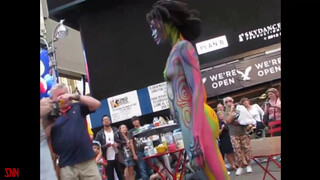 8. Andy Golub body paints model Tynisha Eaton in Times Square
